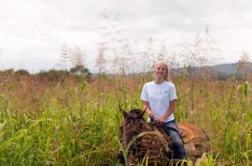 girl riding a horse in Cayo District, Belize – Best Places In The World To Retire – International Living